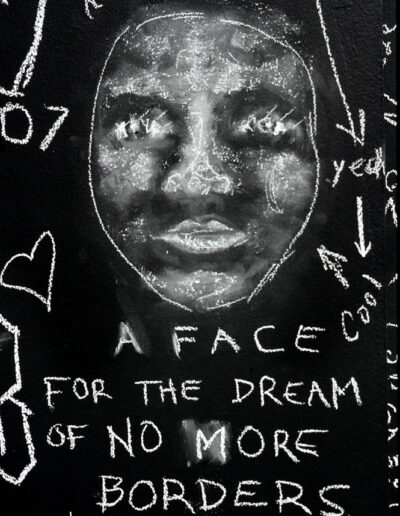 Muriel Hasbun; Documented: The Community Blackboard (A Face for the Dream of No More Borders); 2006