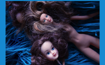 Carole Usdan Dolls on Blue Hula Skirt, Photography, 2010. Image courtesy of the artist.