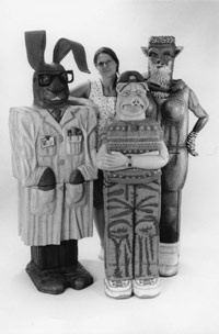 Gayle Weitz poses with some of her humanimals. Image courtesy of the artist.