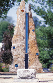 Earthen Blues by Glenn Zweygardt (1997). Granite, stainless steel, enameled steel, cast glass, and cast bronze. Image courtesy of the artist.