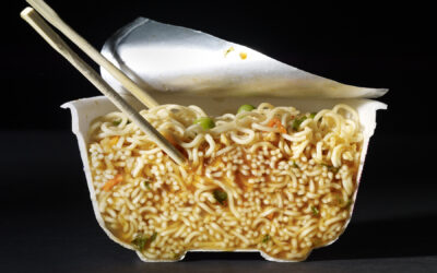 side photo of ramen noodles in bowl with chopsticks